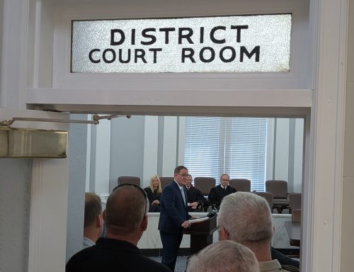 Gregory Speaks to Crowd