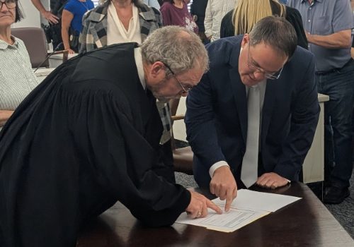 Overflow Crowd Welcomes New District Attorney Jeremiah Gregory